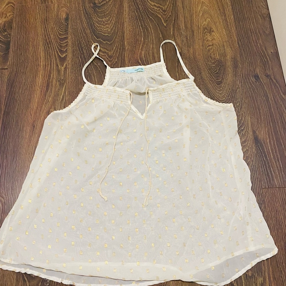 Maurice’s white sheer tank